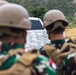 U.S. Marines teach members of Indonesian Korps Marinir about M4 carbine
