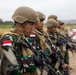 U.S. Marines teach members of Indonesian Korps Marinir about M4 carbine