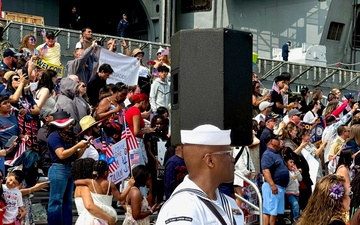 The U.S. Fleet Forces band heralds the return of the USS Harry S. Truman (CVN 75)