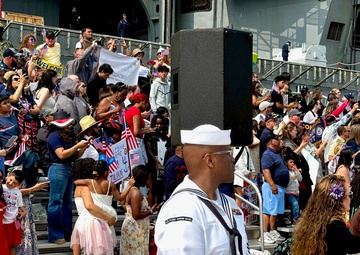 The U.S. Fleet Forces band heralds the return of the USS Harry S. Truman (CVN 75)