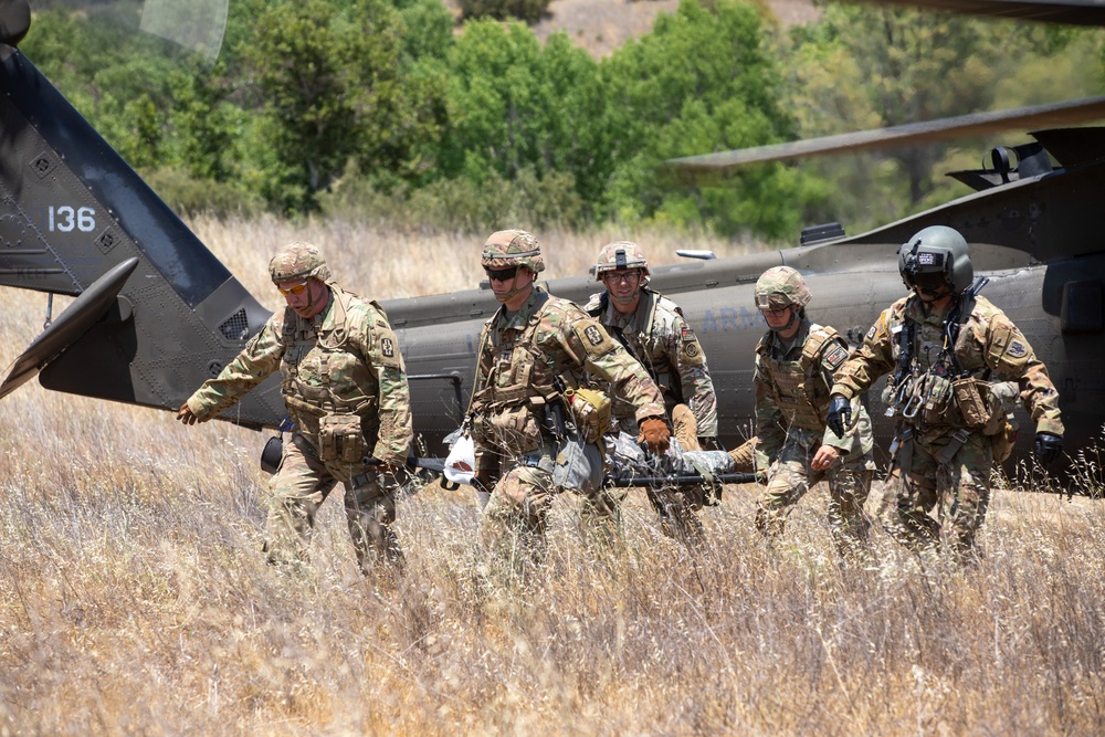 Brig. Gen. Todd Traver goes hands-on as notional casualty during medical unit visits