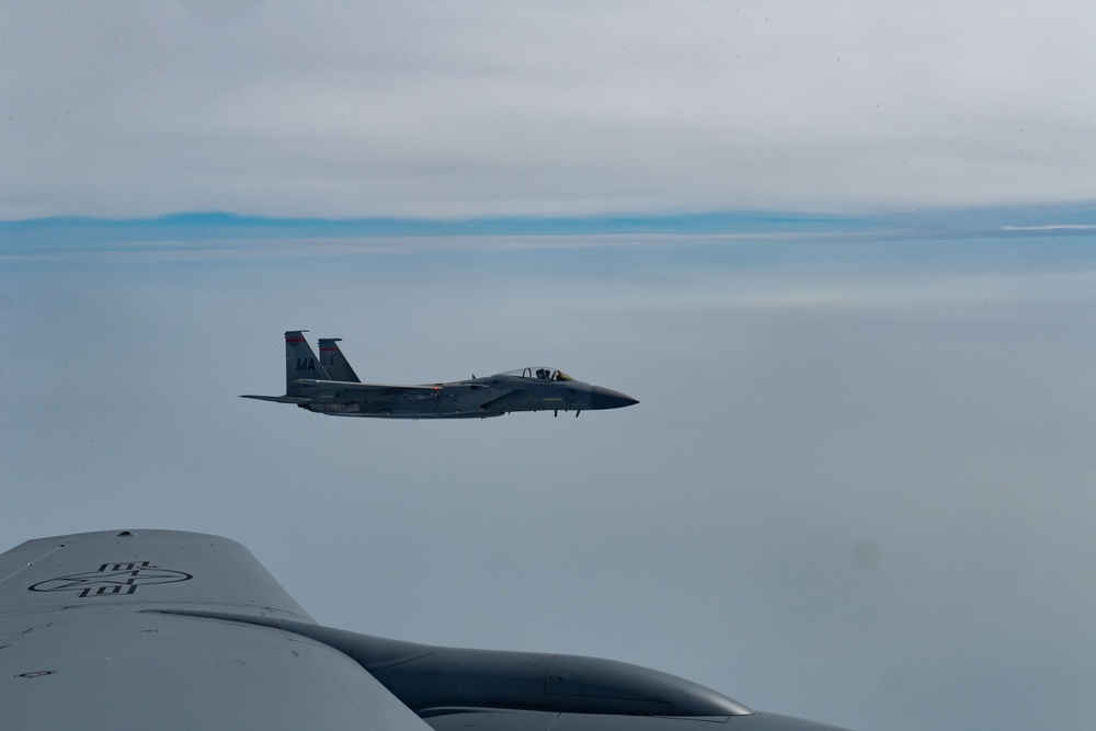 104th Fighter Wing F-15C Eagle Awaits Aerial Refuel from 101st Air Refueling Wing KC-135 Stratotanker