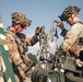 Iowa Army National Guard Cavalry Scouts install cargo net