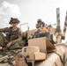 Iowa Army National Guard Cavalry Scout sits on HUMVEE
