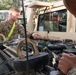 Iowa Army National Guard Soldiers conduct preventive maintenance checks and services