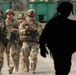 Iowa Army National Guard Soldiers walk to dining facility at JRTC