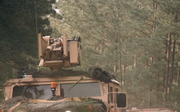 Iowa Army National Guard vehicles convoy to live-fire ranges at JRTC