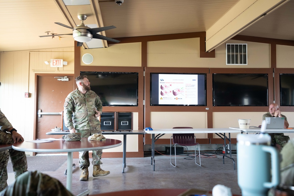 Tech. Sgt. Kyle Giboney instructs a TCCC class during the 152nd Airlift Wing's Superdrill June 6, 2025