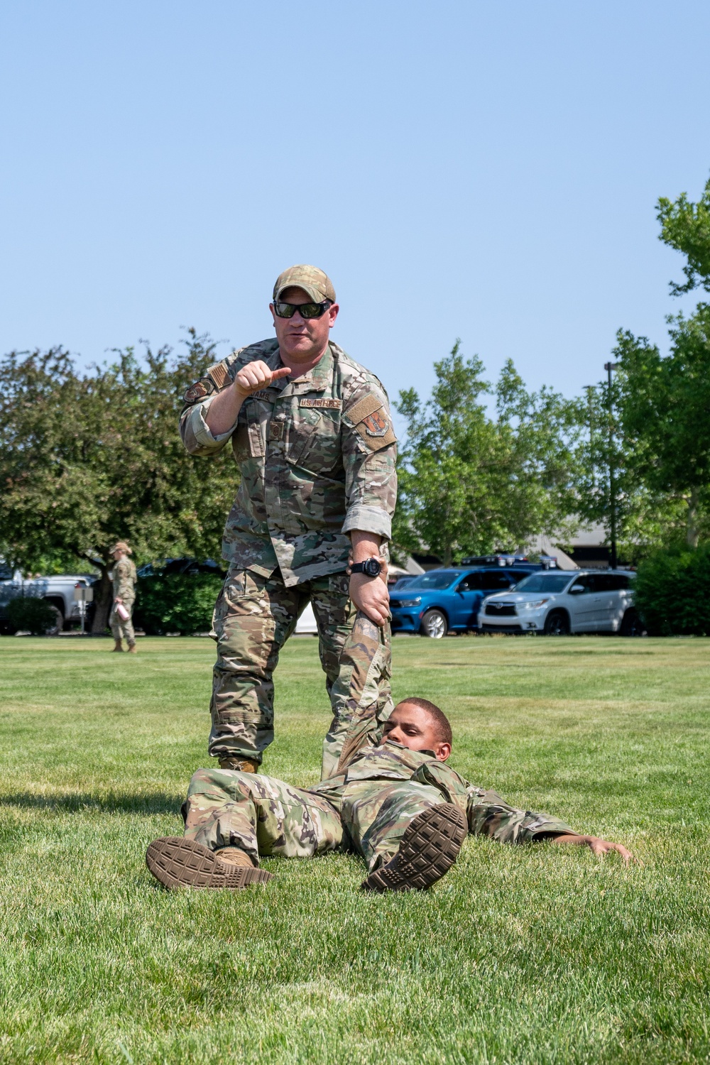 Master Sgt. Christopher Adams, assigned to the 152nd Operations Group demonstrates a one arm drag during TCCC