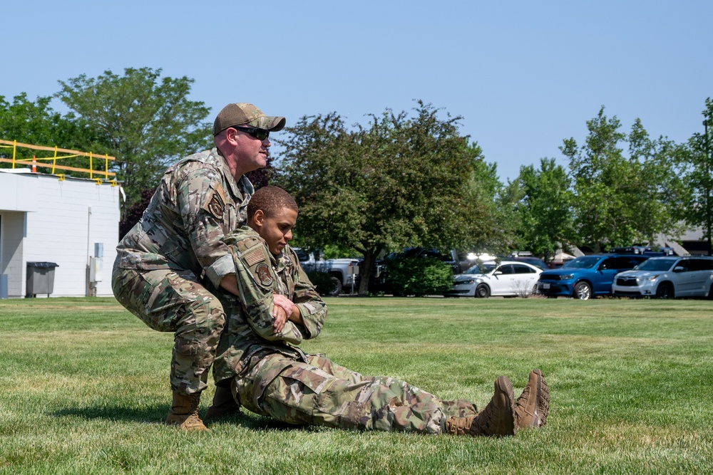 He Ain't Heavy, He's My Brother:  Master Sgt. Christopher Adams, assigned to the 152nd Operations Group, demonstrates a type of drag used when evacuating a patient from immediate danger