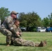 He Ain't Heavy, He's My Brother:  Master Sgt. Christopher Adams, assigned to the 152nd Operations Group, demonstrates a type of drag used when evacuating a patient from immediate danger