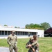 Master Sgt. Christopher Adams, assigned to the 152nd Operations Group, demonstrates a type of carry used when evacuating a patient from immediate danger