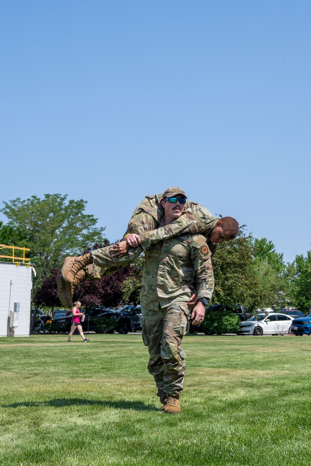 He Ain't Heavy, He's My Brother: Tech. Sgt. Joshua Adams, assigned to the 152nd Medical Group, demonstrates a type of carry used when evacuating a patient from immediate danger