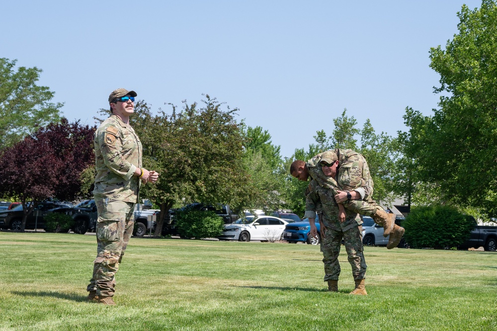 He Ain't Heavy, He's my Brother: Airmen demonstrate various patient carry techniques during TCCC training