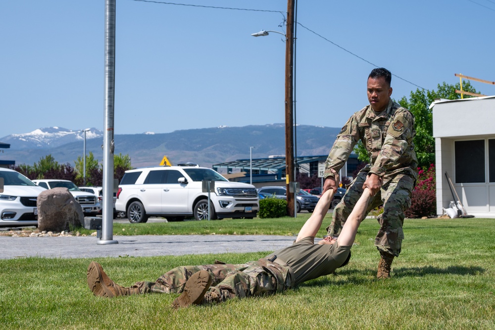 He Ain't Heavy, He's my Brother: Airmen demonstrate various patient carry techniques during TCCC training