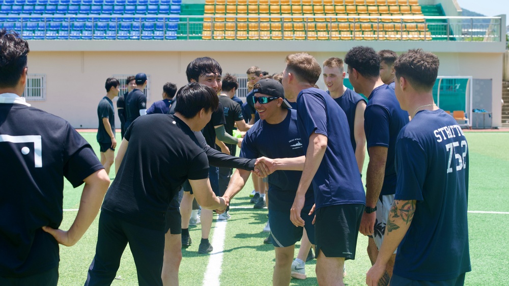 Legend-class USCGC Stratton, Korea Coast Guard members participate in games while in Busan, Republic of Korea