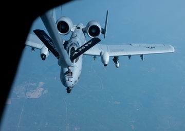 KC-135R Stratotanker Refuels A-10 Thunderbolt II in formation
