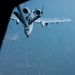 KC-135R Stratotanker Refuels A-10 Thunderbolt II in formation