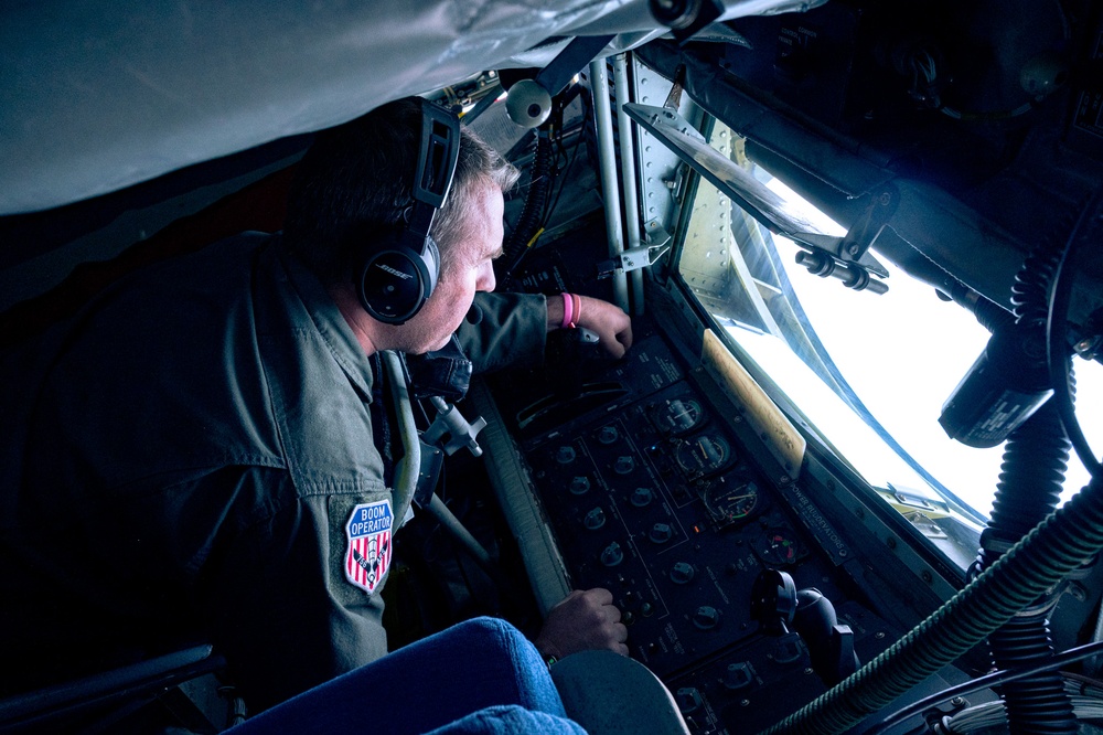 KC-135R Stratotanker Refuels A-10 Thunderbolt II in formation