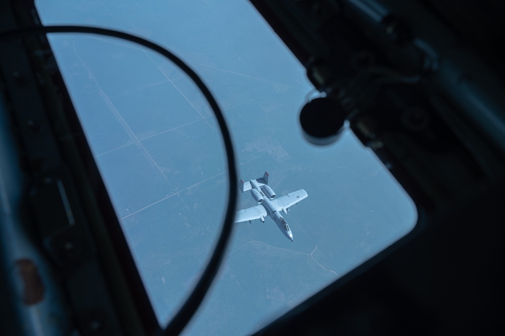KC-135R Stratotanker Refuels A-10 Thunderbolt II in formation