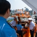 The Legend-class USCGC Stratton crew members receive a tour of Busan Coast Guard Station, Republic of Korea