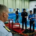 The Legend-class USCGC Stratton crew members receive a tour of Busan Coast Guard Station, Republic of Korea