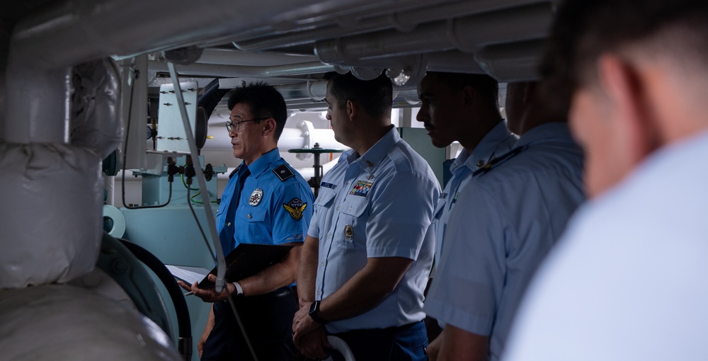 The Legend-class USCGC Stratton crew members receive a tour of Busan Coast Guard Station, Republic of Korea
