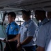 The Legend-class USCGC Stratton crew members receive a tour of Busan Coast Guard Station, Republic of Korea
