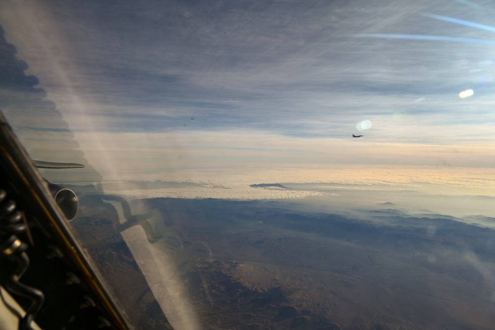 Strategic Asset Gets Tactical: 433rd AW C-5M, Chilean F-16s Team Up for Aerial Maneuvers