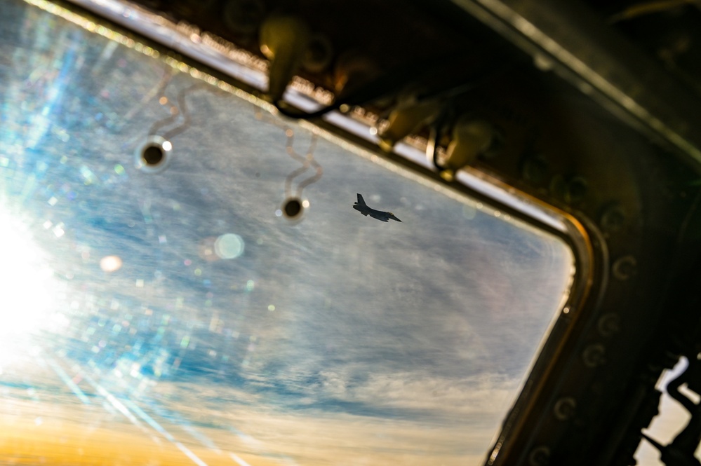 Strategic Asset Gets Tactical: 433rd AW C-5M, Chilean F-16s Team Up for Aerial Maneuvers