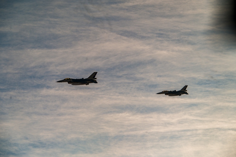 Strategic Asset Gets Tactical: 433rd AW C-5M, Chilean F-16s Team Up for Aerial Maneuvers
