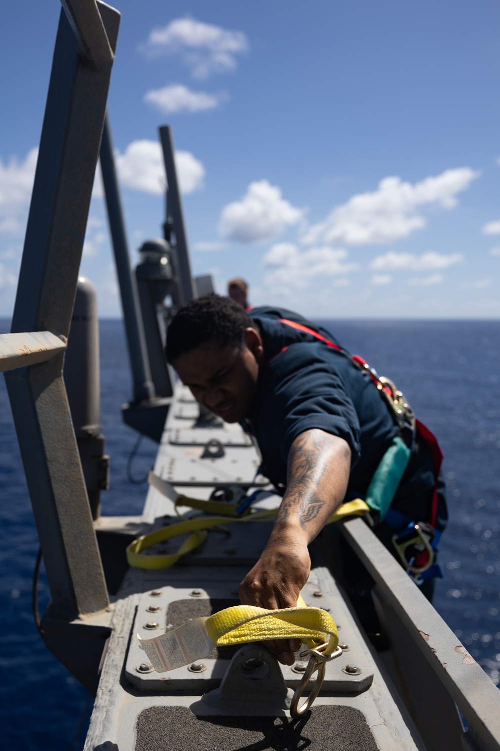 Sailors Aboard USS Oscar Austin (DDG 79) Conduct Maintenance Aloft