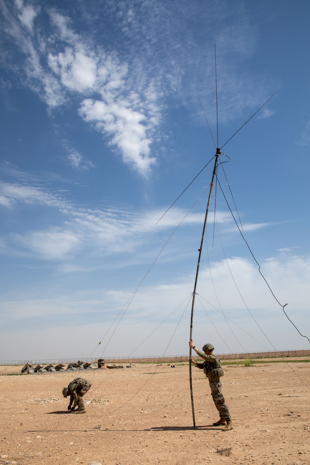 Coalition Forces Set Up Communications For Howitzer Sling Load Operation