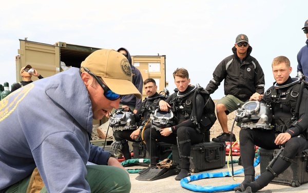 U.S. Navy Divers, Latvian Divers Remove Pylons During BALTOPS 25