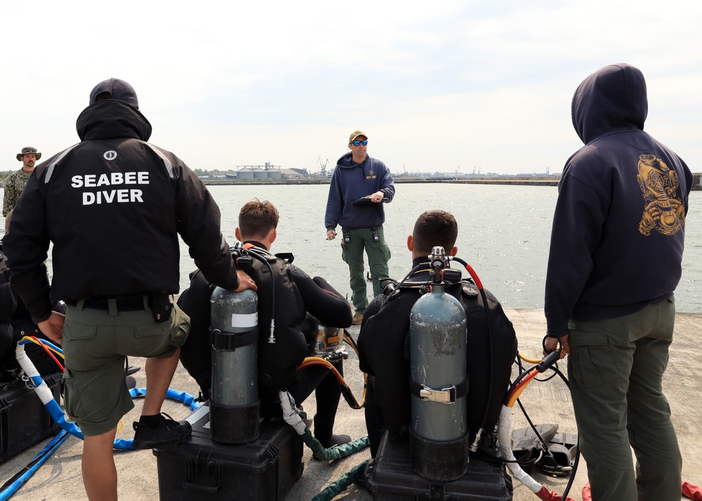 U.S. Navy Divers, Latvian Divers Remove Pylons During BALTOPS 25
