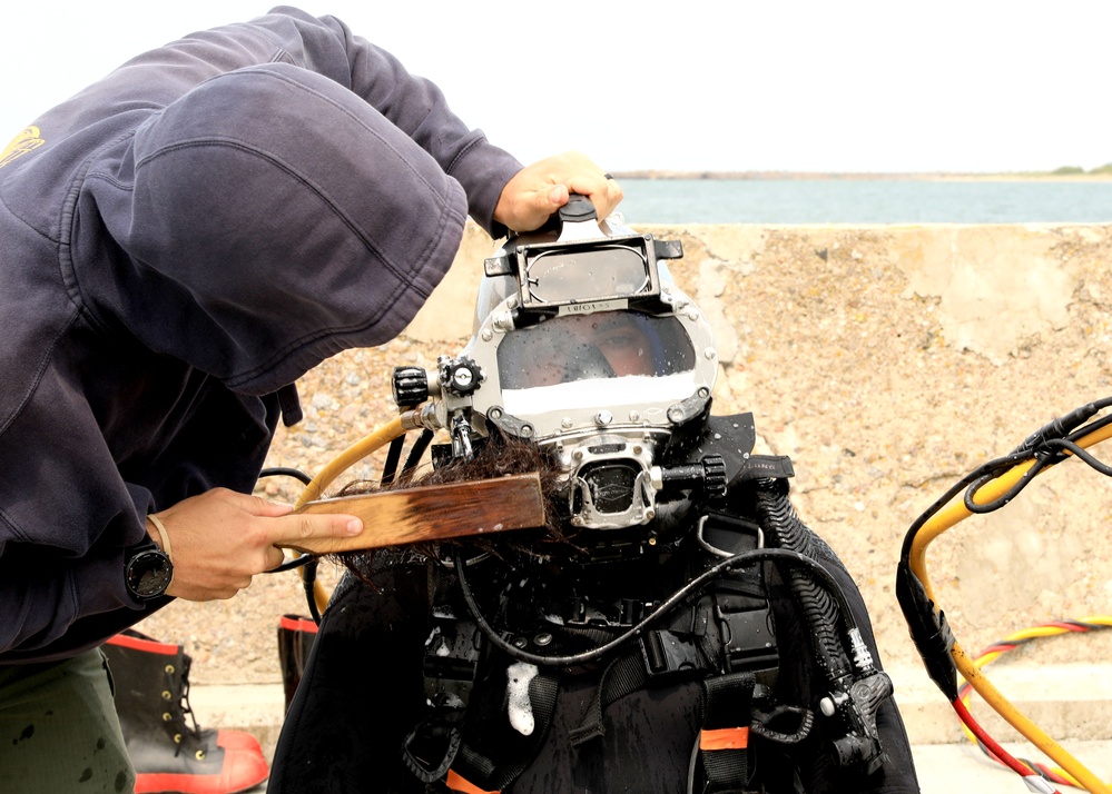 U.S. Navy Divers, Latvian Divers Remove Pylons During BALTOPS 25