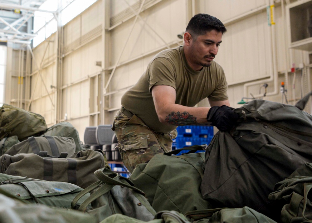 Readiness take center stage with Airmen navigating personnel deployment function line during exercise