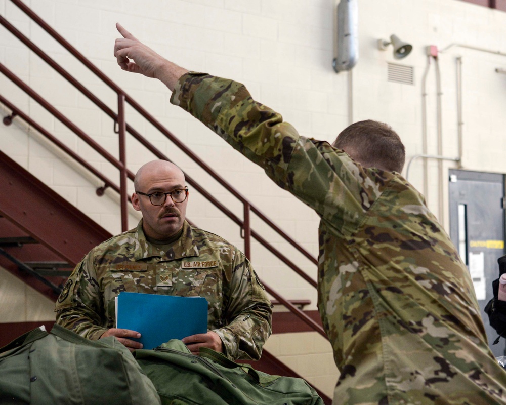 Readiness take center stage with Airmen navigating personnel deployment function line during exercise