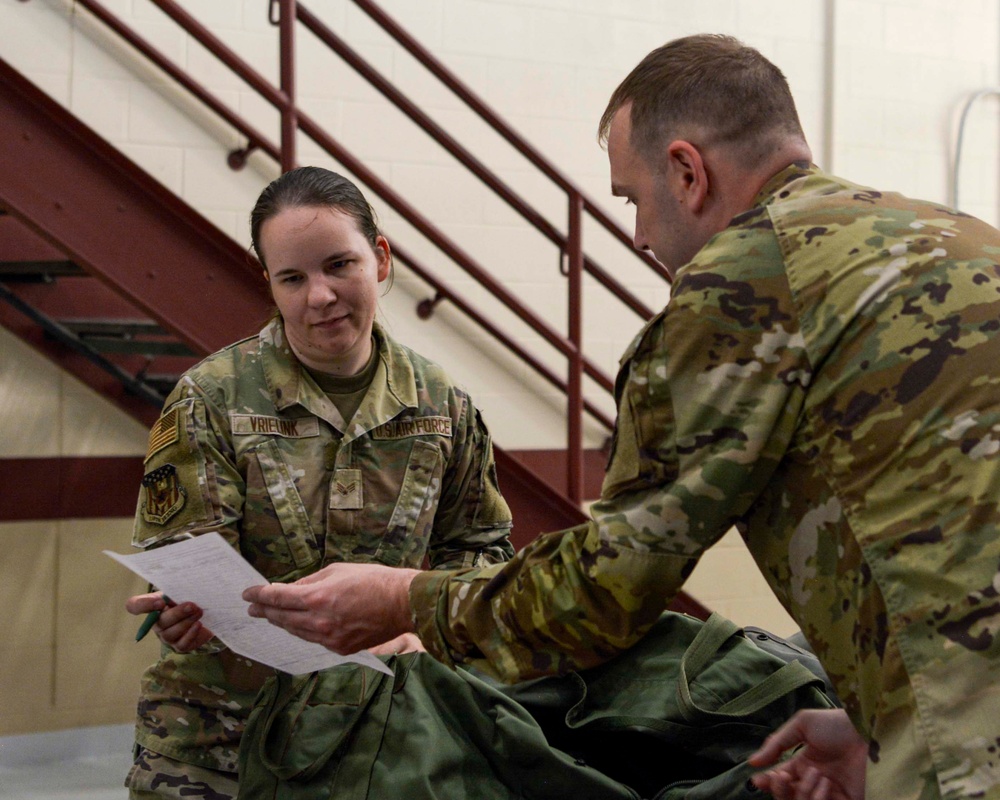 Readiness take center stage with Airmen navigating personnel deployment function line during exercise