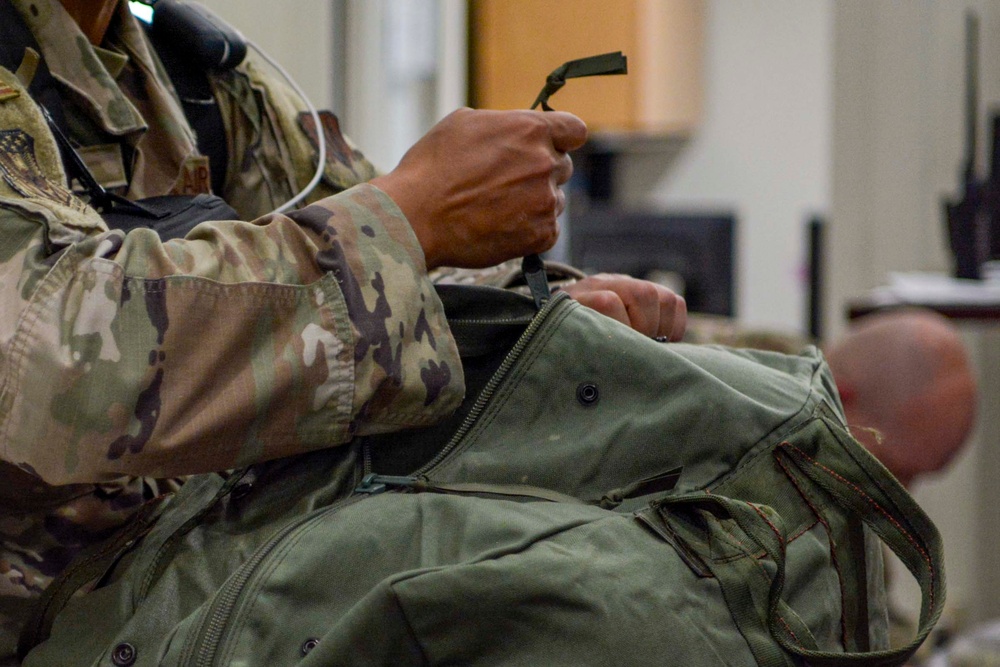 Readiness take center stage with Airmen navigating personnel deployment function line during exercise
