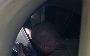 9th AMXS maintains inside the intake of U-2