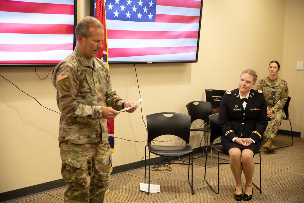 Capt. April McCroskey is promoted to the rank of major at Joint Force Headquarters