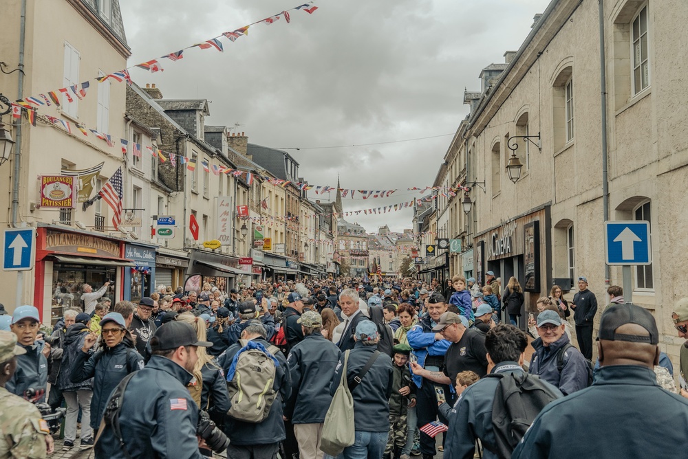 U.S. Army Soldiers and Reenactors March Through Carentan