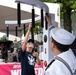 Navy Recruiter Interacts With Crowd