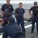 Members of the Legend-class USCGC Stratton take part in law enforcement training in the East China Sea
