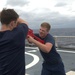 Members of the Legend-class USCGC Stratton take part in law enforcement training in the East China Sea