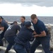 Members of the Legend-class USCGC Stratton take part in law enforcement training in the East China Sea