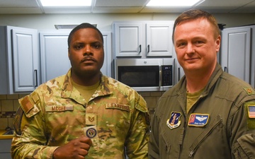 TSGT McGee is presented a coin