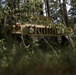 Iowa Guard Humvee concealed during JRTC training