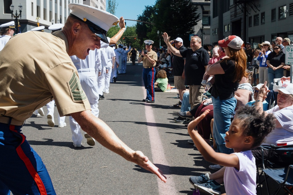 Marines and Sailors Participate in the Grand Floral Parade during Portland Fleet Week